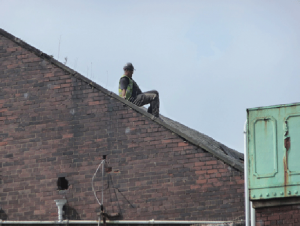 Worker on roof